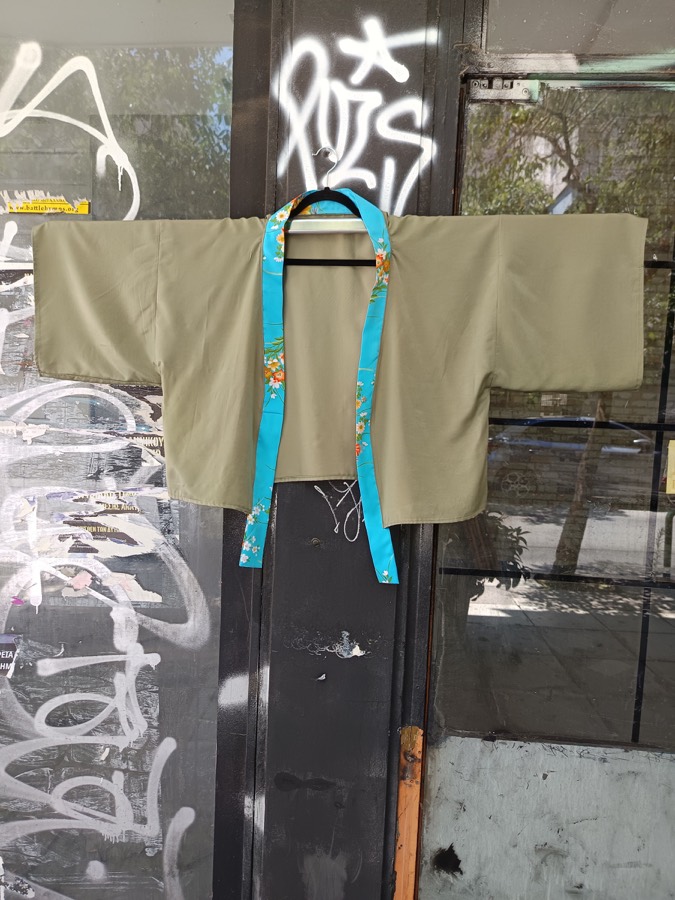 Neutral kimono with blue floral trim from the MAdAME KI kimonos collection